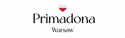 Primadona Warsaw logo on a white background, featuring a small red and white heart above the black text 'Primadona' and 'Warsaw'.